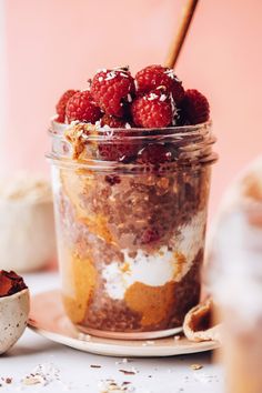 a jar filled with food sitting on top of a table