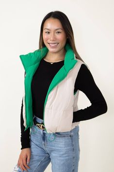 Look your best without sacrificing comfort in this Love Tree Cropped Reversible Puffer Vest for Women in Green/Beige. This reversible vest features a cropped fit for a modern look that's perfect for any occasion. The green and beige colors will make a great addition to your wardrobe. Enjoy the ultimate in fashionable warmth and comfort! Features: Love Tree Style: 5070VY-KELLY Color: Green and Beige 100% Polyester Women’s vest Reversible Center front zipper Puffer design Cropped fit Adjustable wa Trendy Green Vest Outerwear, Sporty Spring Outerwear Vest, Trendy Nylon Spring Vest, Trendy Nylon Vest For Spring, Trendy Spring Nylon Vest, Sporty Green Vest For Spring, Vest For Women, Reversible Vest, Love Tree