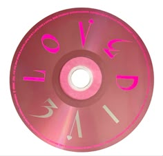 a pink disc with the word love written on it