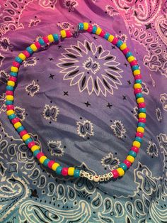 "hi again, friends! welcome back to loom mountain! 💛 this listing is for a strung kandi/pony bead necklace with a lobster claw clasp. the beads are in the color scheme of the pansexual/panromantic pride flag, with square beads at the bottom spelling out \"she/her\" with a heart in-between. thanks again for stopping by! 🏳️️⚧️" Pony Bead Necklace, Bracelets Ideas, Kandi Bracelets, Square Beads, Square Bead, Lgbtq Pride, Pride Flag, Pony Beads, Pride Flags