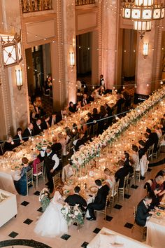 an overhead view of a wedding reception in the grand hall