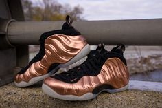 The raffle for the Nike Air Foamposite One "Metallic Copper" just opened up on pufferreds.com rules at the top! A cross between b-ball greatness and legendary off-court style, this icon retains the liquid look of the Foamposite upper. The signature "1 Cent" logo and low-profile cushioning let others know it's game time. What does it mean to you? Check in @pufferreds for more. #pufferreds #raffle Airmax Nike, Nike Foamposite, Bow Sneakers, Puma Platform Sneakers, Black Metallic, Hoka Running Shoes, Nike Dunks, Sneaker Head