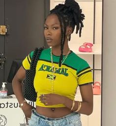 Cute Jamaica topAvailable in Yellow, Green and BlackAvailable in S, M and L Please note delivery can take up to 2 weeks from date of dispatch Jamaica Crop Top, Carribean Festival, Jamaican Outfits For Women, Carribean Outfit, Carribean Outfits, Jamaica Shirt, Jamaica Outfits, Jamaican Culture, Button Piercing