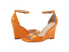 Marc Fisher LTD Camira - Women's Sandals : Orange Patent : Shine like a star at the party by donning the fabulous and glossy Marc Fisher LTD Camira heels designed to add chic to your outfit. Faux patent leather upper. Man-made lining and footbed. Buckle closure on the ankle strap. Open and square toe construction. High wedge heel design. PU outsole. Imported. Summer Leather Heels With Glossy Finish, Summer Glossy Leather Heels, Summer Glossy Finish Leather Heels, Spring Fitted Wedge Heel, Fitted Wedge Heels For Spring, Summer Patent Leather Heels With Padded Heel, Sleek Patent Leather Sandals For Spring, Glossy Finish Sandals For Formal Occasions, Spring High Heel Patent Leather Sandals