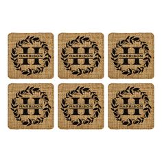 four coasters with the letter h in black on burlocked fabric, set of 4