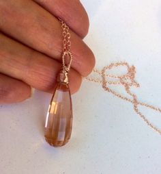 Handmade Morganite stone pendant Necklace. Peach pink Beryl Morganite.  14k gold. Teardrop. Elegant Feminine jewelry. Gifts under 100.  Very large, faceted, peach Morganite gem stone hand wrapped and suspended on gold chain, which is standard 18" long and can be adjusted for you free if charge from 12 to 22" long. Gorgeous, micro faceted stone is pretty big and measures about 19 ct.  The stone is approximately 26 x 10 mm.  I can make a set for you per request. Matching earrings https://www.etsy. Morganite Teardrop Jewelry Gift, Teardrop Morganite Jewelry Gift, Elegant Pink Wire Wrapped Crystal Necklace, Gold Morganite Jewelry Gift, Peach Teardrop Jewelry For Gifts, Elegant Pink 14k Gold Filled Necklaces, Elegant Pink 14k Gold-filled Necklace, Elegant Pink 14k Gold Filled Necklace, Elegant Handmade Rose Gold Crystal Necklace