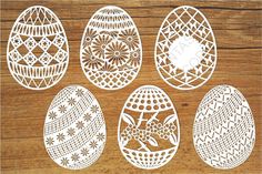 paper cut easter eggs on wooden background