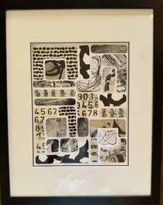 a black and white framed artwork with numbers