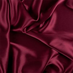 This 2 Way Stretch charmeuse satin its super soft and silky to the touch. The fabric is perfect for Dresses. This satin is light weight and it flows real good and drapes nice. The satin feels real silky and like real silk but it's made up of polyester and spandex tread. This satin can be use for wedding dresses-Prom dresses-nightgowns- linings-decorations and much more --- Create an incredible fashion statement and wrap yourself in your own design. Length:36 inches Width:58-60 inches 95% polyest Curtain Backdrop Wedding, Maroon Aesthetic, Burgundy Aesthetic, Charmeuse Fabric, Silk Charmeuse, Red Aesthetic, Stretch Satin, Red Satin, Red Silk