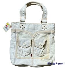 Levi’s White Handbag New With Tags Casual Satchel With Zipper Pocket For Errands, Casual White Satchel For Errands, Casual White Shoulder Bag With Multiple Pockets, Casual White Satchel With Zipper Pocket, White Shoulder Bag With Pockets For Spring, Levi's Casual Bags For Everyday Use, White Bag With Multiple Pockets For Everyday Use, Casual Levi's Bags For Everyday Use, Levi's Casual Everyday Bags