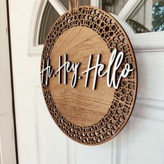 a wooden sign that says, the joy he'll do hanging on a door