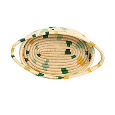 an oval basket with green and yellow stripes