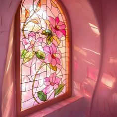 a stained glass window with pink flowers on it