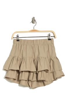 Tiered ruffles define this easy to pull-on skort designed with comfy shorts underneath. 15" length (size Small) Lined 80% rayon, 20% nylon Hand wash, line dry Imported Model stats: 5'10" height, 32" bust, 25" waist, 36" hip. Model is wearing size Small. Casual Ruffled Shorts For Summer, Vacation Shorts With Ruffles And Stretch, Casual Summer Shorts With Ruffles, Beige Ruffled Bottoms For Vacation, Casual Ruffled Skirt Shorts For Vacation, Ruffled Cotton Shorts For Summer, Summer Ruffle Shorts, Tiered Ruffle Hem Shorts For Day Out, Stretch Cotton Skort With Ruffles