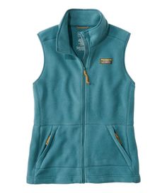 Our best-value everyday fleece vest has it all: cozy warmth, classic style and three-season versatility, all at a great price. Slightly Fitted. Best with lightweight layer. Falls at hip. Fabric made from at least 63% recycled polyester. Machine wash and dry. Bean Boot lace-inspired zippers and drawcord. Features our classic Mount Katahdin logo. Elastic arm holes and drawcord hem seal out cold air. Two lower zippered hand pockets. Imported. Fit: Slightly Fitted | Women's Mountain Classic Fleece V Casual Hiking Vest With Fleece Lining, Outdoor Fleece Vest, Outdoor Sleeveless Fleece Vest, Sleeveless Fleece Vest For Outdoor, Casual Fleece Vest For Outdoor Activities, Casual Fleece Vest For Outdoor, Casual Outdoor Fleece Vest, Casual Fall Vest With Fleece Lining, Casual Fleece Vest With Pockets