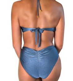 Make a fiery poolside statement with our shimmery ocean blue Claudia monokini. This sexy suit features a is thoughtfully designed in our shimmery ocean blue Brazilian fabric with elevated gold accents at the front and neck ties. Side cutouts accentuate and shape the waist and a high hip cut gives you legs for days! Full cut back with ruching offers more coverage with a touch of fun. High cut leg with full coverage Halter neck tie Super soft, compressive, comfortable and breathable Double lined S High Hips, Neck Ties, Monokini, Ocean Blue, High Cut, Blue Ocean, Halter Neck, Gold Accents, Neck Tie