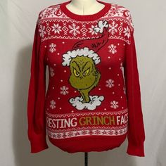 Dr. Seuss "Resting Grinch Face" Ugly Christmas Sweater New With Tag Size: S Or Small Can Be Worn As A Womens, Please Ask For Measurements As Needed Color: Red Background With The Image Of The Grinch With Wording "Resting Grinch Face" And Snowflakes In The Background Long Sleeves Crew Neckline Ribbed Neckline, Cuffs, And Hemline Material: 55% Cotton, 45% Polyester Item Marked To Prevent Store Return Grinch Christmas Sweater, Resting Grinch Face, Grinch Face, Blue Crewneck, Black Christmas, The Grinch, Sweaters Crewneck, Ribbed Neckline, Dr Seuss