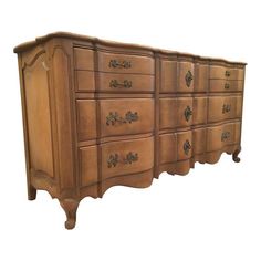 an old wooden dresser with many drawers