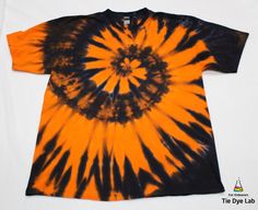 an orange and black tie - dyed t - shirt