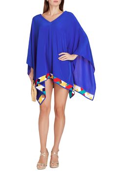 Crafted from buttery soft chiffon, this playful poncho features the label's signature vibrant color block bandage trim, offering versatility in a statement look. Color block cross bandage trim One size Length 29 inches Designed for a loose fit Lightweight, soft viscose chiffon fabric Slightly sheer Imported Hand wash, lay flat to dry Chic Summer Cape Poncho, Chic Summer Poncho In Cape Style, Blue One-size Poncho For Vacation, Blue Poncho For Beach In Spring, Blue Poncho For Spring Vacation, Blue Poncho For Vacation In Spring, Spring Vacation Blue Poncho, Chiffon Cover Up, Sheer Cover Up