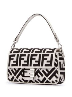 Find FENDI Baguette Crossbody Bag on Editorialist. The FENDI Baguette Crossbody Bag is crafted from calf leather with the iconic FF motif and silver-tone hardware. The bag features an internal logo patch, main compartment, internal zip-fastening pocket, and a foldover top with a single detachable top handle. The bag can be worn crossbody or on the shoulder. Luxury Baguette Bag With Detachable Strap, Designer White Top Handle Baguette Bag, Designer White Baguette Bag With Top Handle, Designer Baguette Shoulder Bag With Branded Hardware, Designer White Baguette Bag, Designer Baguette Bag With Branded Hardware, Luxury White Crossbody Baguette Bag, Luxury White Baguette Crossbody Bag, Luxury White Baguette Bag With Top Handle