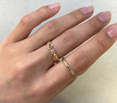 "Vintage 1940s engraved wedding band. Never been worn - what I call \"New/Old Stock\". The solid 14k yellow gold band is engraved with delicate orange blossom flowers and a milgrain edge. The band is simple and elegant on its own, but can be stacked and paired with other accessories for a lovely statement look. Other pictures show different stacking rings together and on a hand to give ideas and more details. The primary picture is the item for this listing. More information: -2.3mm -) wide (the Engraved Wedding Band, 1940s Wedding, Wedding Band Engraving, Stackable Bands, Engraved Wedding, Plain Bands, Gold Engraving, Band Photos, Deco Engagement Ring