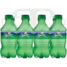 six bottles of spring water on a white background