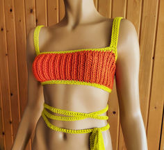 Cropped Bralette Crochet Rave Top Outfit, Orange Yellow Halter Knit Tank Top Orange Halter Top For Summer Beach, Orange Summer Halter Top For Beach, Orange Halter Top For Spring Beach Occasions, Orange Halter Top For Beach In Spring, Stretch Orange Halter Top For The Beach, Orange Halter Neck Tank Top For Summer, Fitted Orange Crochet Top For Vacation, Fitted Orange Crochet Top For Summer, Yellow Sleeveless Crop Top For Festival