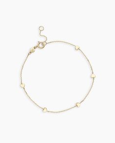 Achieve a truly timeless look with the 14k Gold Heart Bracelet. This beautiful solid gold chain bracelet features dainty heart details, making it the perfect addition to your daily stack. To wear, stack alongside other solid gold or diamond bracelets. More is more! Heart Bracelet in 14k Solid Gold, Women's by gorjana Gorjana Bracelet, Bday Wishlist, Preppy Bracelets, Gold Heart Bracelet, Solid Gold Charms, Bridesmaid Rings, Gold Chain Bracelet, Gold Bridesmaids, Solid Gold Bracelet