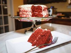 a slice of red velvet cake on a plate