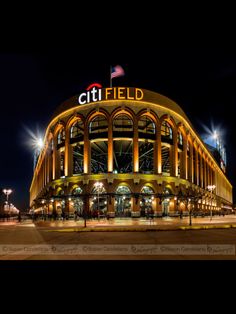 the citi field at night with lights on