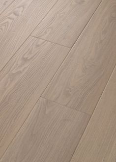 an image of wood flooring that looks like it has been painted in light brown