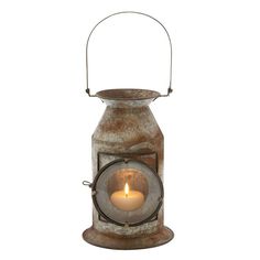 a metal lantern with a lit candle inside