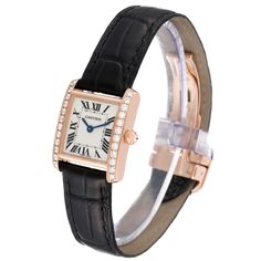 Cartier Tank Francaise Rose Gold Diamond Black Strap Ladies Watch WE104531. Quartz movement. 18K rose gold rectangular case 20.0 x 25.0 mm case. Octagonal crown set with original Cartier factory diamond. Original Cartier factory diamond bezel. Scratch resistant sapphire crystal. Silver dial with black radial roman numerals. Sword shaped blue hands. Secret Cartier signature at 10. Black leather strap with 18k rose gold deployant buckle. Classic Square Watch For Formal Occasions, Classic Square Watches For Formal Occasions, Classic Square Formal Watches, Timeless Rectangular Jewelry And Watches For Evening, Elegant Rectangular Jewelry And Watches For Evening, Formal Yellow Gold Diamond Watch With Rectangular Shape, Classic Rectangular Jewelry With Diamond Hour Markers, Elegant Yellow Gold Rectangular Watch, Classic Square Watches With Diamond Hour Markers