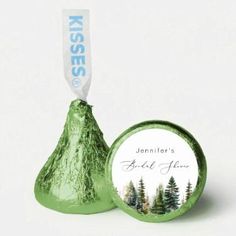 a green herss candy bar with an image of trees on the front and back