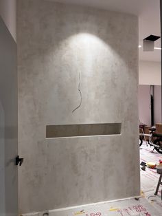 a white wall with a hole in it