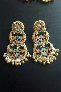 Kundan Earrings and Statement Kundan Jewelry for Indian as well as Pakistani Brides. *It is a pair of Handmade Indian Ethnic Kundan Earrings with Multi color Real Kundan Stones. *Its made from Silver and Copper, Turqoise,Pink and White Kundan Stones Settings with 22k gold Plating. *It gives Pure Ethnic Look with Antique Touch and is 3.3 Inches Long. *Our all jewelry is made from semiprecious stones and beads. *WARRANTY: ITS GENUINE HANDMADE JEWELRY AND WE ARE GIVING LONG LIFE WARRANTY FOR OUR AL Traditional Multicolor Round Hoop Earrings, Traditional Multicolor Hoop Earrings, Traditional Multicolor Chandbali Hoop Earrings, Multicolor Chandbali Earrings With Intricate Design, Multicolor Chandbali Chandelier Earrings, Multicolor Chandbali Bridal Earrings With Intricate Design, Multicolor Heavy Chandbali Bridal Earrings, Multicolor Intricate Chandbali Bridal Earrings, Multicolor Traditional Hoop Earrings With Latkans