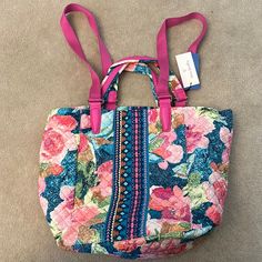 Bright Floral Pattern, Hidden Charger Pocket, 2 Inner Zip Pockets, Multiple Straps That Can Be Worn On The Shoulder Or In Your Hand. Measures 19”Wx12.5”Lx8.25”D Open Top With Metal Hook Closure Floral Print Summer Bags, Trendy Floral Print Bags For Vacation, Bohemian Floral Print Bags For Vacation, Casual Multicolor Floral Print Bag, Bohemian Multicolor Floral Print Bag, Multicolor Floral Print Vacation Bags, Casual Floral Print Bags For Vacation, Spring Floral Print Fabric Bag, Yellow Purses