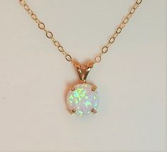 "OPAL NECKLACE - LAYERED SET OF 2 These opals are a real showstopper. Gorgeous flecks of color romantically shimmer as the opal catches the light. Dress it up or dress it down; versatile and suitable for many occasions. (Very popular gift for the girlfriend!) This comes as either a layered set of two separate necklaces or you can purchase just one. IT'S IN THE DETAILS ✦ Purchase as a set of both or choose your preferred necklace ✦ These will come separate, each with their own clasp ✦ Gold Filled Gold Opal Jewelry, Dainty Opal Necklace, Opal Necklace Gold, Opal Necklace Silver, Lavender Opal, Jupiter Fl, Dainty Gold Necklace, Necklace White, Vermeil Jewelry