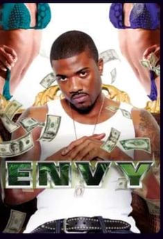 a man standing in front of a poster with money on his chest and the words envy written below him