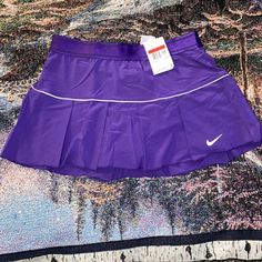 Women’s Nike Essential Victory Tennis Skirt W/ Shorts Cj1606-546 Purple Sz Large. Brand New With Tags 88% Polyester (100% Recycled), 12% Spandex Plain Jersey. True To Size Mid Rise Packages Are Usually Shipped Within 3 To 5 Business Days. Everything You See In The Photo You Will Get In The Same Condition You See It In. If You Got Any Questions Or Any Offers Shoot A Dm. Need More Pictures? Dm Me We Answer Within 12 Hours. Purple Tennis Skirt, Navy Tennis Skirt, Nike Tennis Skirt Outfit, Nike Skirt, Nike Skirts, Tennis Skirt Outfit, Athletic Skort, Athletic Skirt, Pleated Tennis Skirt