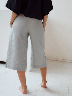 "Terracotta culottes linen pants for woman. Short loose pants with pockets. Choose size: XS Waist 66 - 68 cm. / (26\" - 26 3/4\") Hips 90 - 92 cm. / (35 1/2\" - 36 1/4\") S Waist 70 - 72 cm. / (27 3/4\" - 28 1/4\") Hips 94 - 96 cm. / (37\" - 37 3/4\") M Waist 74 - 76cm. / (29 1/4\" - 30\") Hips 98 - 100 cm. / (38 1/2\" - 39 1/4\") L Waist 78 - 80 cm. / (30 3/4\" - 31 1/2\") Hips 102 - 104 cm. / (40 1/4\" - 41\") XL Waist 82 - 84 cm. / (32 1/4\" - 33\") Hips 106 - 108 cm. / (41 3/4\" - 42 1/2\") Spring Wide-leg Flax Bottoms, Spring Wide-leg Flax Color Bottoms, Spring Flax Wide Leg Pants With Pockets, Spring Flax Wide-leg Pants, Chic Linen Cropped Leg Bottoms, Chic Linen Bottoms With Cropped Leg, Summer Cropped Wide Leg Pants With Pockets, Summer Wide Leg Cropped Pants With Pockets, Chic Flax Pants With Pockets