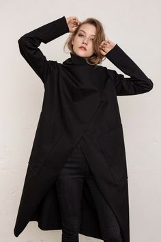 Coat women / Long coat / Jacket / Minimalist / Oversized coat / Asymmetrical coat / Elegant coat /Trench coat / Black coat Composition 80% Wool 20% Polyester Model is 175cm height Size guide XS Bust: 82-85cm, Waist: 62-66cm, Hips: 86-90cm S Bust: 86-89cm, Waist: 66-70cm, Hips: 90-94cm M Bust: 90-93cm, Waist: 70-74cm, Hips: 94-98cm L Bust: 94-97cm, Waist: 74-80cm, Hips: 99-105cm XL Bust: 98-103cm, Waist: 80-86cm, Hips: 106-112cm XS: EU34 / US 2 / UK6 / FR 34 S: EU 36 / US 4 / UK8 / FR 36 M: EU 38 Oversized Long Sweater Coat In Solid Color, Black Oversized Long Wool Coat, Oversized Long Sleeve Wool Coat In Solid Color, Oversized Long Sleeve Wool Coat, Spring Oversized Wool Coat In Solid Color, Oversized Wool Coat For Work With Long Sleeves, Oversized Long Sleeve Wool Coat For Work, Oversized Black Wool Coat For Fall, Oversized Wool Coat For Work