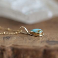 Our new LBJ Drop of Gold Pendant is a Solid Gold - 14K and 18K Gold Hubei Turquoise Pendant Necklace. One of a Kind and Ready to Ship Teardrop Turquoise Gold Necklace. You will receive the exact Hubei Turquoise Pera Shaped Gold Pendant in the Photos. Stunning alone, stacked or worn as a charm. The term dripping with gold comes to mind ... fabricated with 14K solid gold sheet and bail and 18K solid Gold bezel, this gorgeous, earthy, pear-shaped Hubei Turquoise cabochon is a solid gold drop of sun Elegant Turquoise Chrysoprase Necklace, Heirloom Turquoise Necklace As Gift, Heirloom Turquoise Necklace For Gift, Fine Jewelry Turquoise Gemstone Necklace In Yellow Gold, Fine Jewelry Turquoise Necklace In Yellow Gold, Fine Jewelry Yellow Gold Turquoise Gemstone Necklace, Fossil Ring, Hubei Turquoise, Gold Sheets