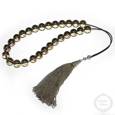 SKU: YI-QU-429  Categories: Quartz, Precious Gemstones  Description Smoky Quartz handmade komboloi created with 27 natural Smoky Quartz Gemstone beads of 12mm diameter in round shape with original tibetan silver metals, 36cm total length, 27cm + 9cm natural silk tassel and 64g total weight. It comes with a gift vintage pouch. Healing Power: Clear Quartz is a stone of manifestation that energizes and activates the energy centers within the body. It helps the wearer to think clearly, allowing them Adjustable 8mm Beads For Jewelry Making, Adjustable Spiritual Round Beads, Rare Beads, Precious Beads, Unique Collectibles, Healing Power, Natural Silk, Prayer Beads, Precious Gemstones