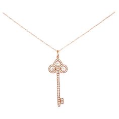 Tiffany & Co Fleur de Lis Diamond Key Pendant withChain Style: Pendant Necklace Ref. number: GRP08993 Metal: 18kt Rose Gold Size / Measurements: Pendant 1.5' Inches / Chain 18' Inches TCW: 0.40 tcw Main Diamond: 60 Round Brilliant Diamonds Hallmark: ©TIFFANY&CO. AU750 Includes: T&C Jewelry Pouch Retail: $6,050 Sku#15565TBJ011423 Glamorous Jewelry, Tiffany And Co, Key Pendant, Jewelry Pouch, Tiffany & Co., Or Rose, Jewelry Necklace Pendant, Pouch, Rose Gold