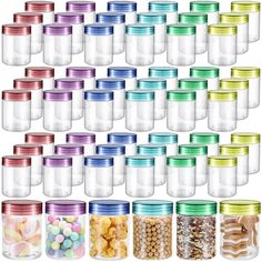 many different colored glass jars with lids and candy beans in each jar, all lined up together