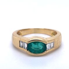 Vintage Emerald Ring, 1ct Oval Emerald, Chunky Ring, Emerald ring, bezel setting ring, Gold Vintage Ring, Estate Jewelry, Unisex men ringy Jewelry Yellow Gold 18k (the gold has been tested by a professional) Total Carat Weight: 1.25ct (Approx.) Total Metal Weight: 7.96 g Size: 8.25 US \ 18.35 mm Grading Results: Stone Type: Diamond Shape: Baguette Carat: 0.25ct (Approx.), Stones quantity:4 Color: F Clarity:VS Grading Results: Stone Type: Emerald Shape: Oval Carat: 1ct (Approx.), Stones quantity:1 Color:green Feel free to contact us for inquiries and consultation and special requests. The item will be shipped in a luxury box and bag ready as a gift - The shipment package is also ready as a gift - you can send your special item straight as a gift :) Certification included: Our shop certifica Emerald Bezel Set Oval Cabochon Ring, Oval Emerald Diamond Ring With Bezel Setting, Classic Oval Gia Certified Signet Ring, Classic Emerald Ring With Bezel Setting, Oval Cabochon, Classic Oval Emerald Ring With Bezel Setting, Timeless Oval Emerald Ring With Bezel Setting, Oval Cabochon Bezel Set Fine Rings, Classic Oval Emerald Ring With Tension Setting, Luxury Oval Emerald Ring With Bezel Setting