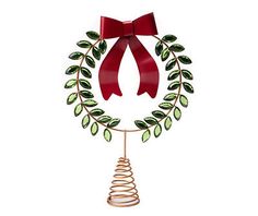 a christmas wreath with a red bow hanging from it's side on a stand