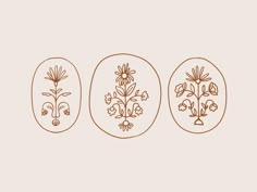 three oval drawings with flowers in them